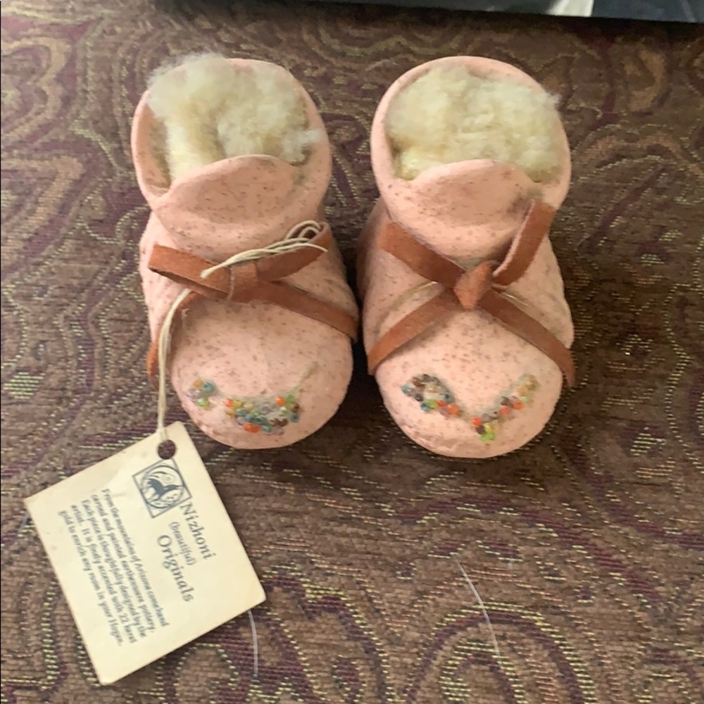 Hand carved Earth ware pottery moccasins